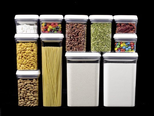 Square-shaped storage containers are easy to stack and organize in a tiny house pantry or small kitchen.