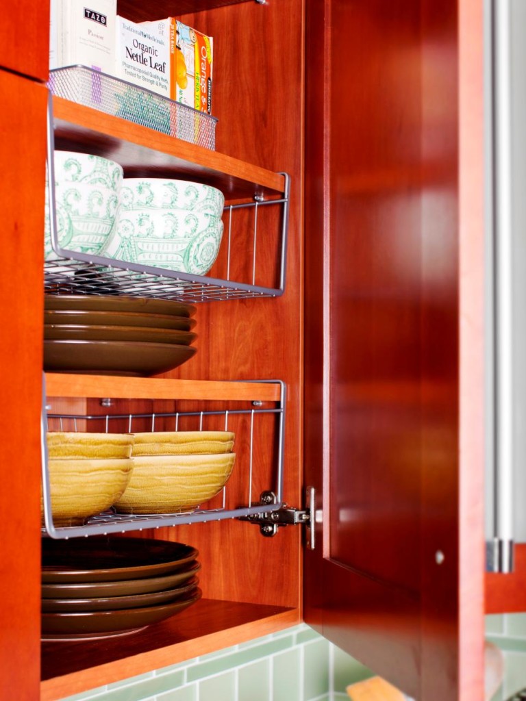 Make the most of extra cupboard space above your dishes, with organizing wire under-shelf baskets.