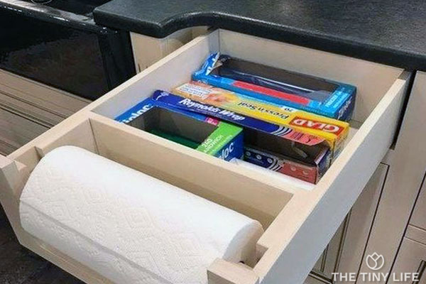  Drawer organizers are useful for housing multiple items like paper towels, plastic wrap, tinfoil, and other bulky boxes.