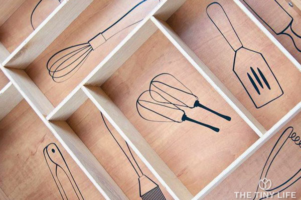 If you want to keep drawers organized, try outlining each item in the bottom of the drawer.