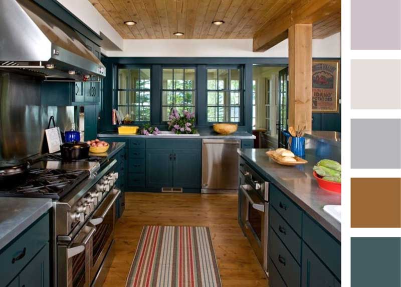 Teal and rustic wood touches make this country-style kitchen look charming. Concrete countertops and hardwood floors add a luxurious feel.