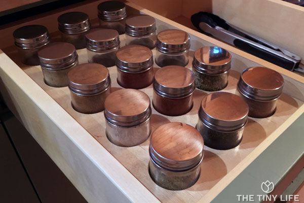 A spice drawer looks great with specially made organizing inserts to keep the jars lined up in order.