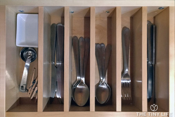 An organized silverware drawer is made easy with drawer inserts.