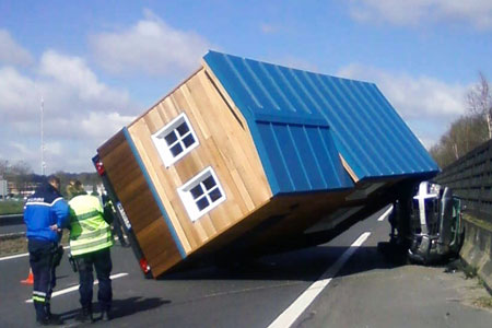 tiny house tipped over on highway