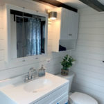Austin tiny home builder bathroom with white shiplap