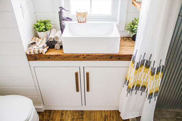tiny house bathroom sink and cabinet