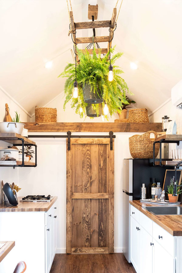 barn door in tiny house kitchen