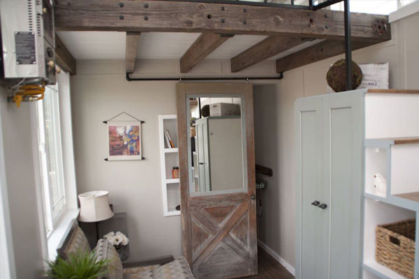 tiny home with interior barn door