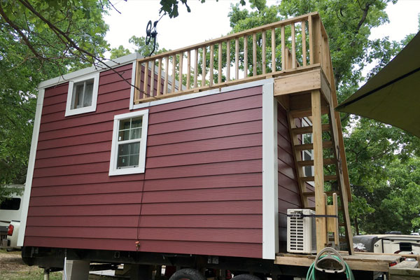 rooftop deck on tiny house with stairs