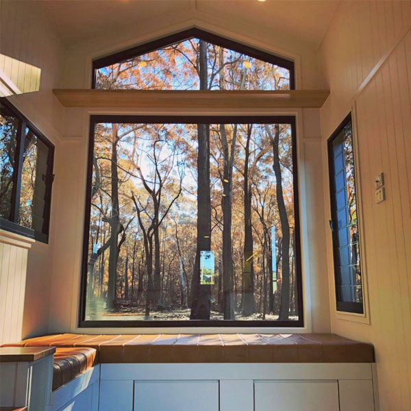 large wall of windows in tiny home
