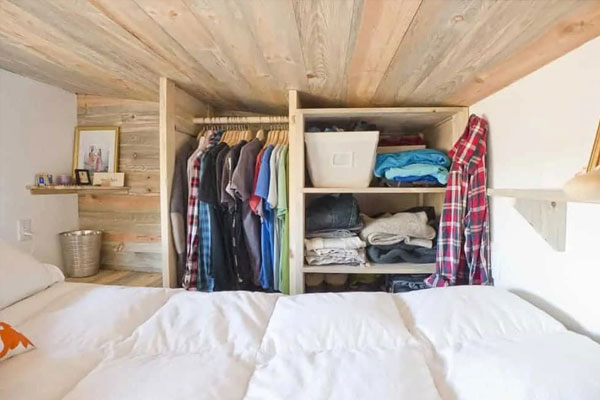 closet in a tiny home loft