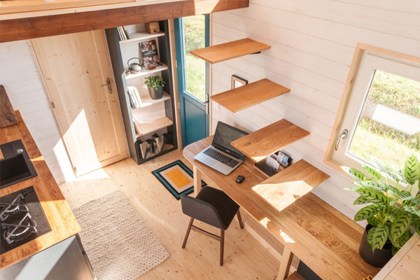office under stairs in tiny home