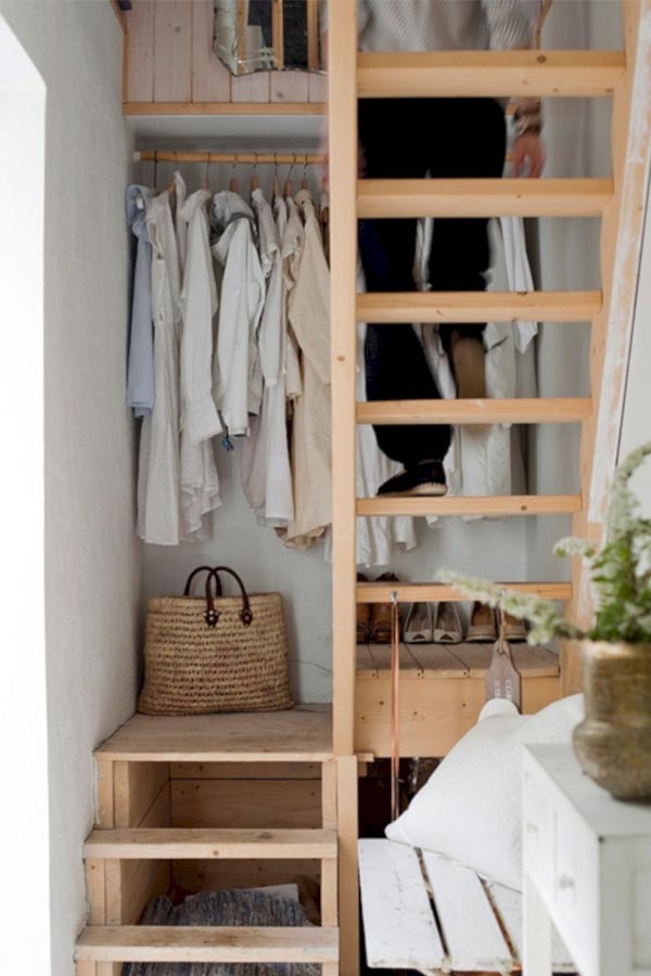closet storage in tiny house stairwell