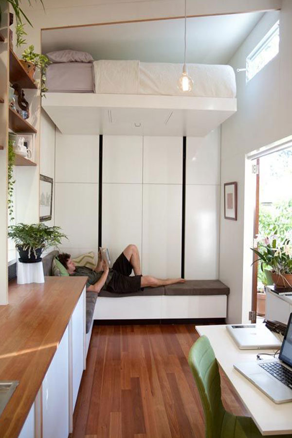 tiny house elevator bed over sofa