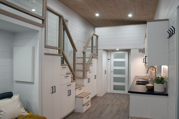 charme tiny house kitchen and stairs