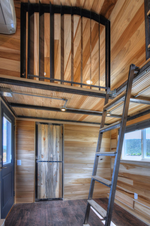 the pemberley tiny house ladder to loft