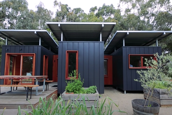 connected tiny houses with a shared living room