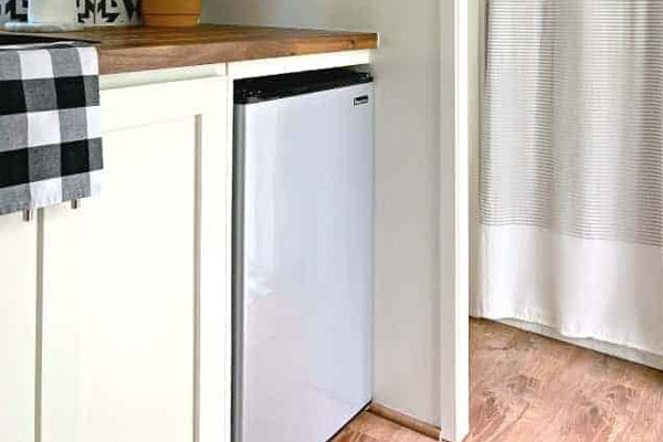 refrigerator In a cargo camper