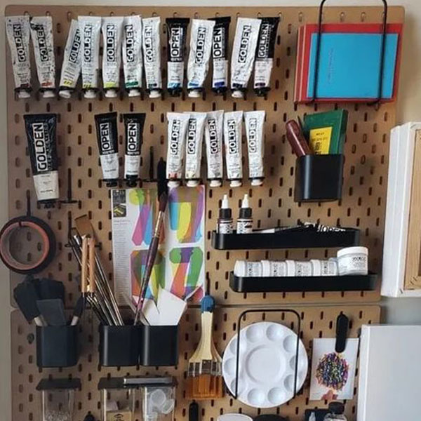use pegboard to organize painting supplies