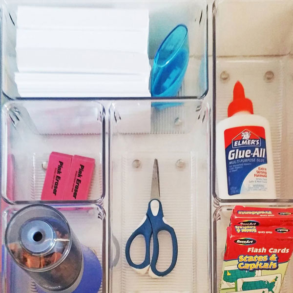 organization trays for glue scissors and craft supplies