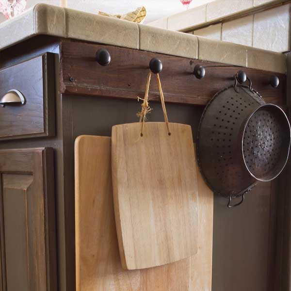 hang cutting boards on cabinet knobs