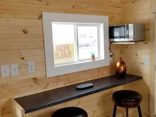 Image showcasing Indiana Tiny House Builders - The Tiny Life
