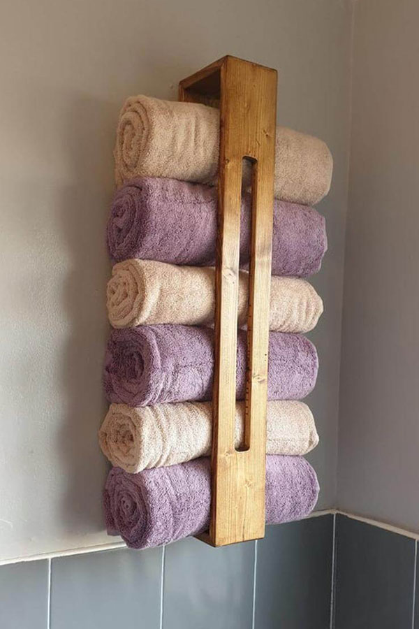 store towels on unique wall hanger