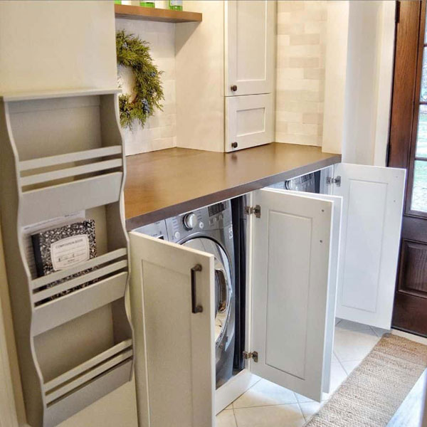 under cabinet storage in a small laundry room