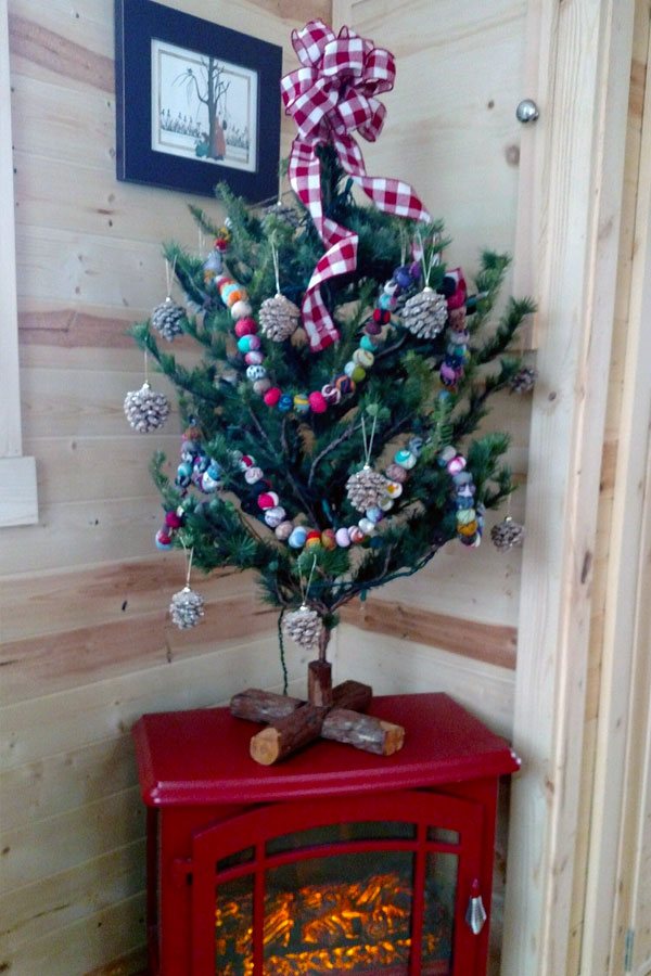 small christmas tree in a tiny house