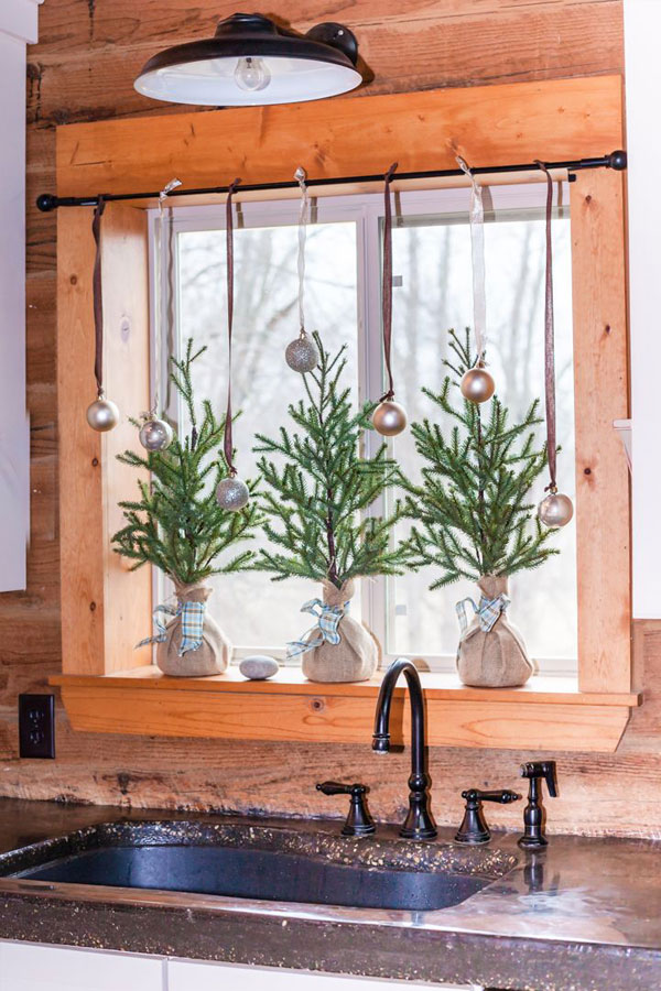 small christmas trees in a tiny house