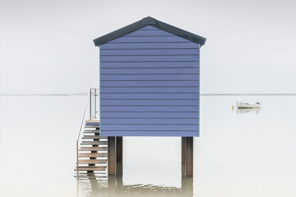 tiny hut on stilts at beach