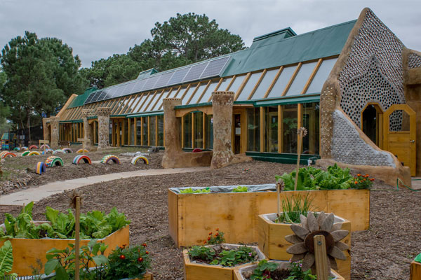 earthship constructed with glass walls