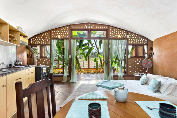 earthship living room extended outdoors