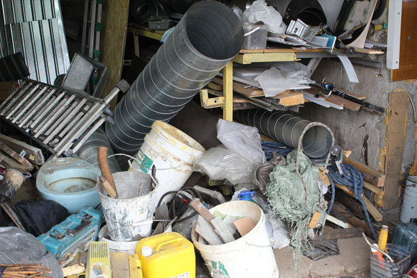 trash in a messy garage