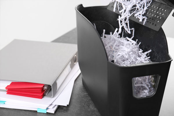 discard or shred unneeded paper clutter