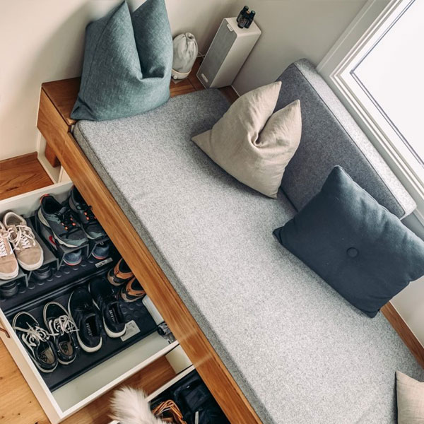 under couch storage in a tiny home