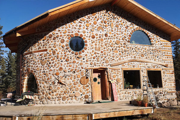 Cordwood House With Porch