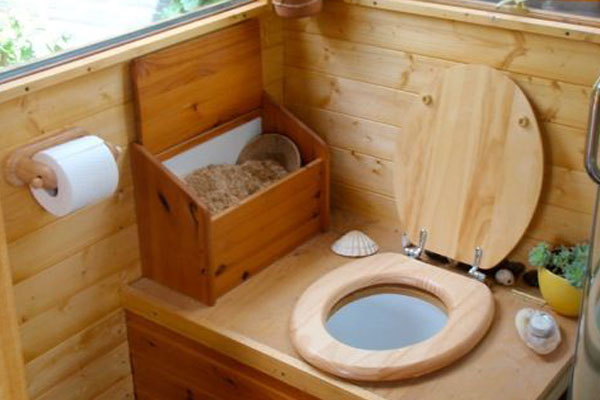 off grid toilet with woodchip bin